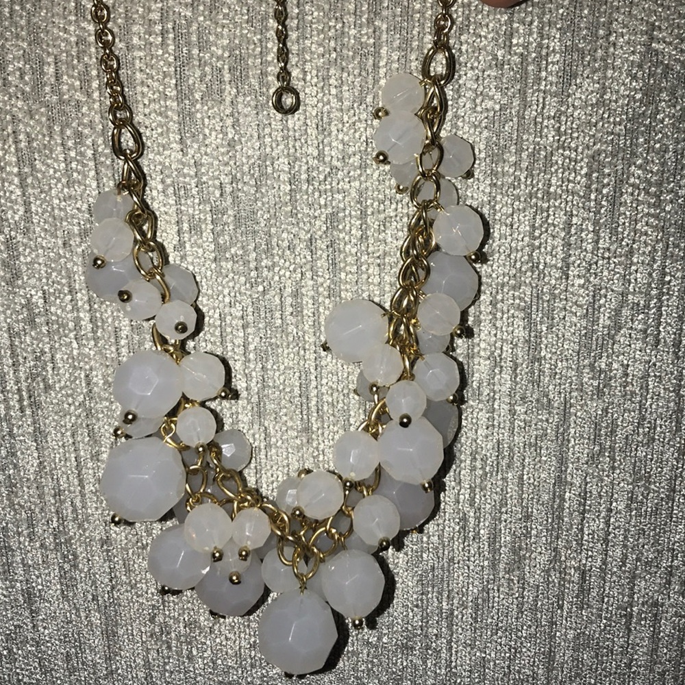 White gem necklace with gold chain